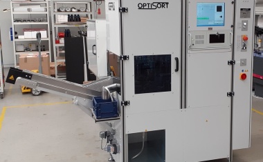 Testing and sorting system for small components