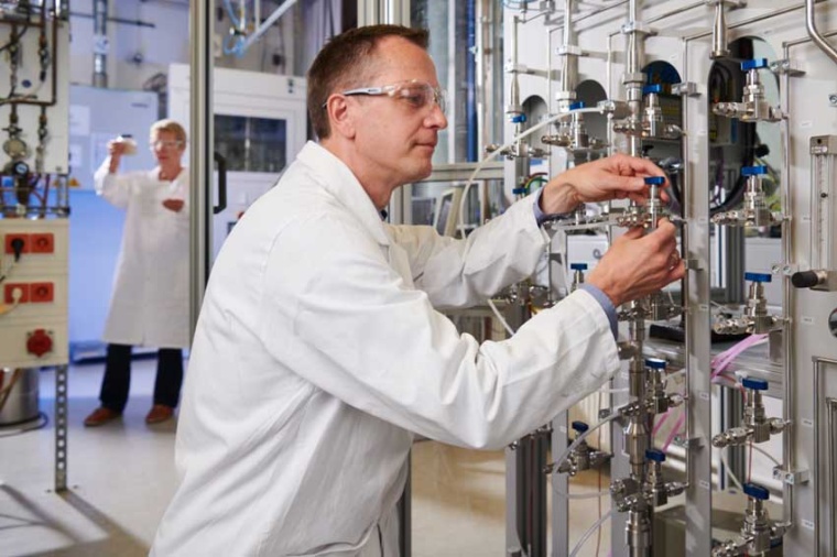 The researchers use a multi-adsorption system to investigate the adsorption...