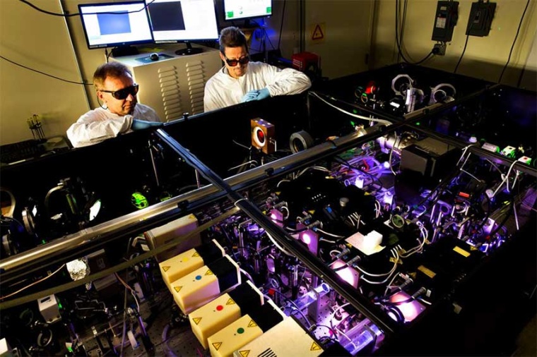 CUOS researchers performing research on the applications of ultrashort laser...