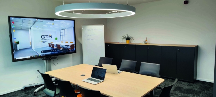 The meeting room has been modernized and adapted to the corporate design....