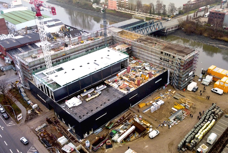 Topping-out ceremony at the new headquarters. (Image: EK Robotics)