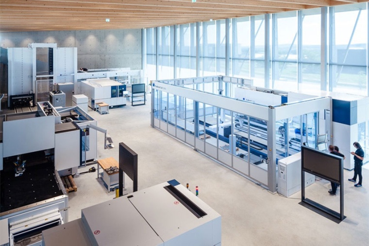 The two-floor building combines offices, seminar rooms, storage areas, a...
