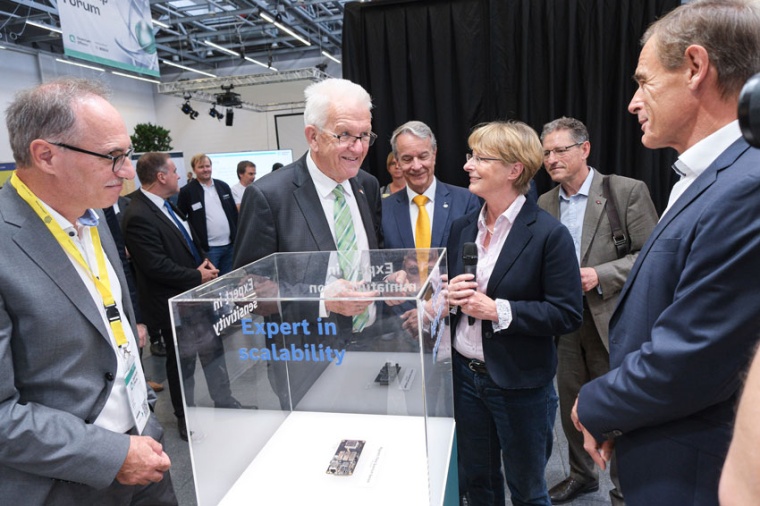 Baden-Württemberg’s Minister-President Winfried Kretschmann (center left)...