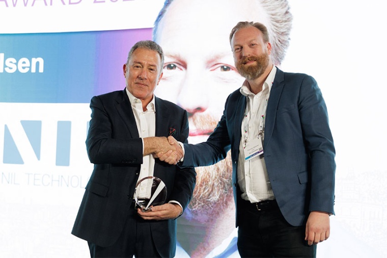 EPIC President Basil Garabet presents the EPIC CEO Award 2025 to Theodor...