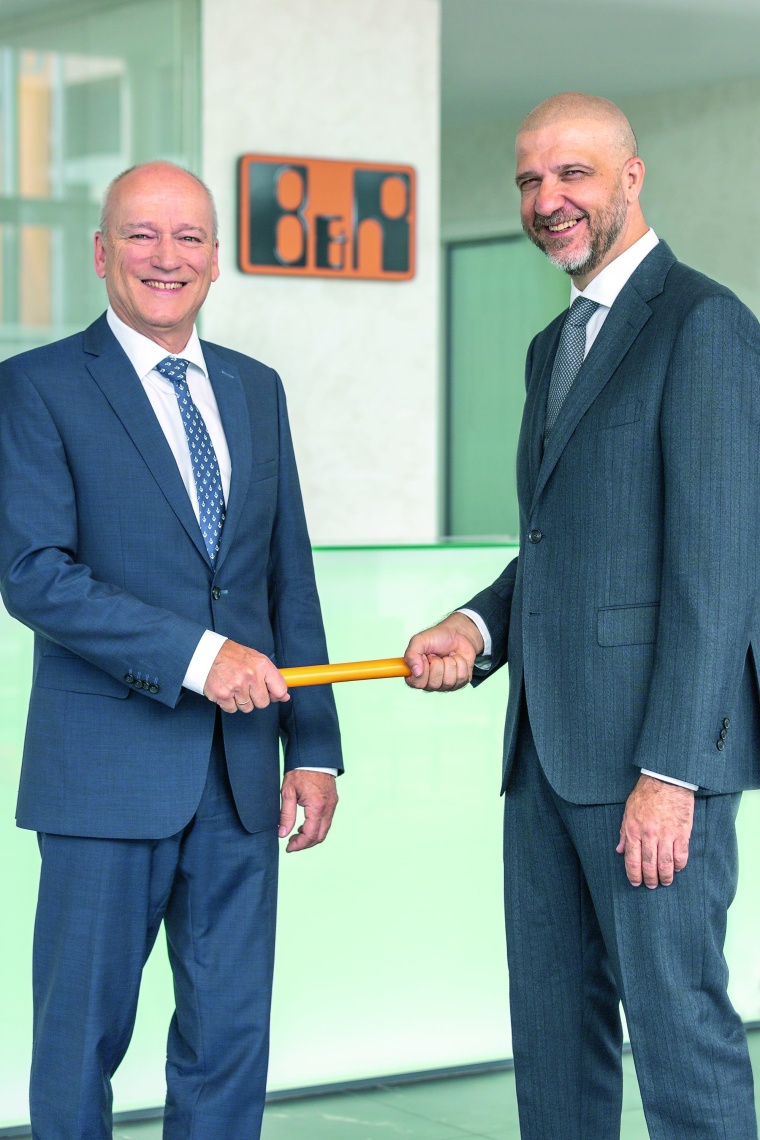 Peter Gucher (left) retires after 34 years at B&R and hands over his position...