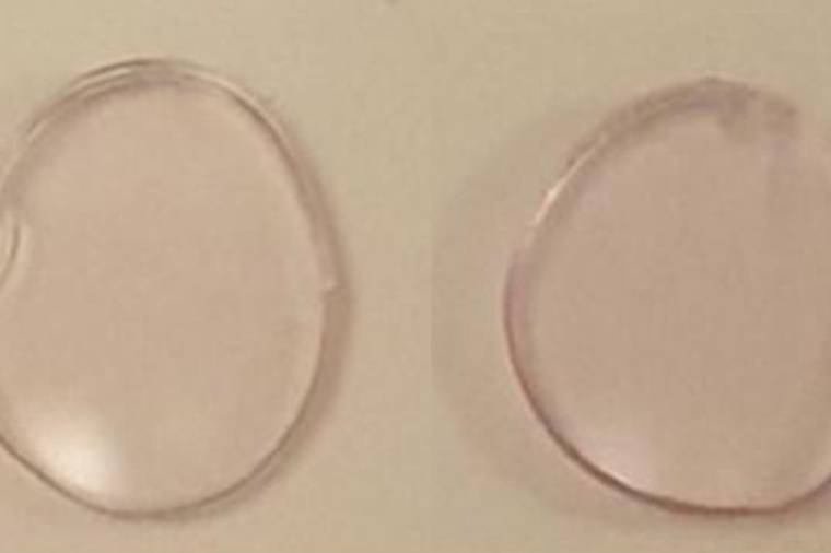 Rose-tinted contact lenses about 10 mm in diameter containing gold...