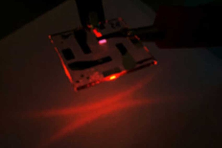 New device architecture for photonic devices allows directional and polarized...