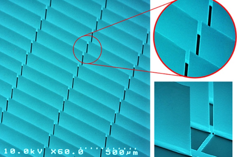 SEM micrograph of vertically standing, flat micromirror array. (Source: Hillmer...