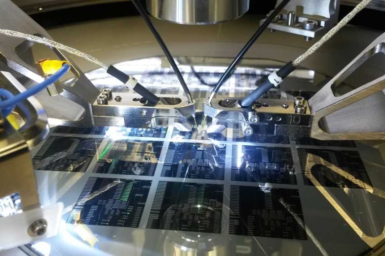 Measurement setup with wafer prober, optical fiber probes and wafer with test...