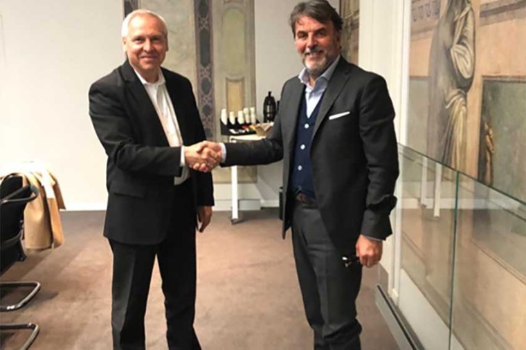 Steffen Scholz, head of M&A of Trumpf (left), and Marco Salmaso, CEO of Sisma...