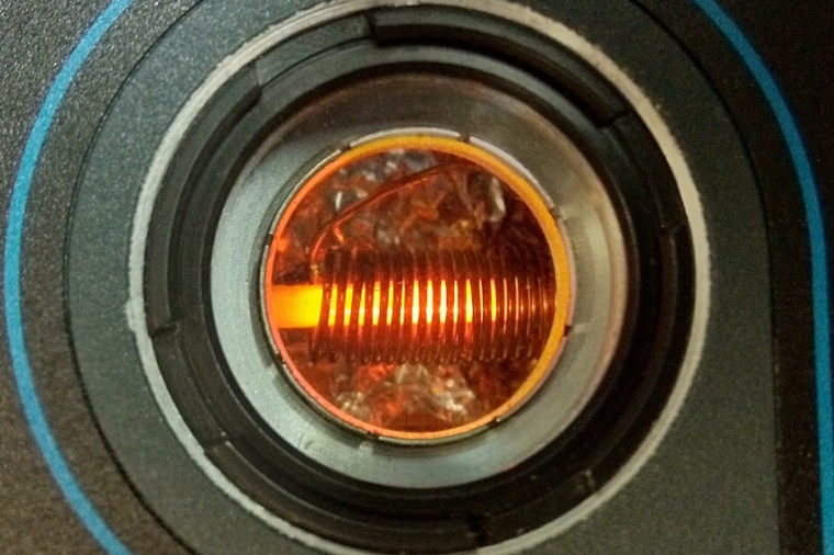 A crystal is used for storing photonic qubits and illuminated by a laser in a...