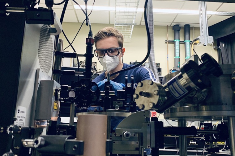 Doctoral student Len van Deurzen works with a lab setup used to operate a...
