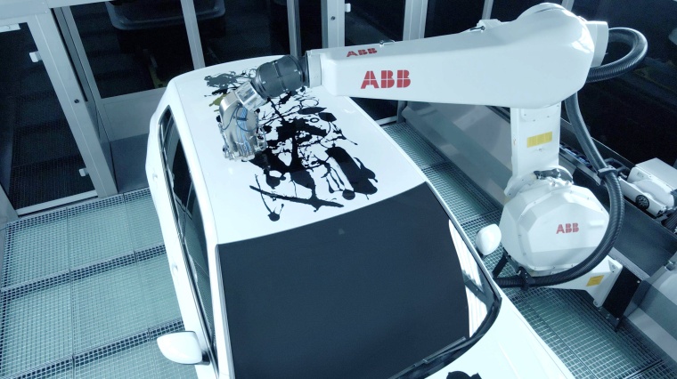 ABB PixelPaint robots painted an abstract artwork by young artist Advait...