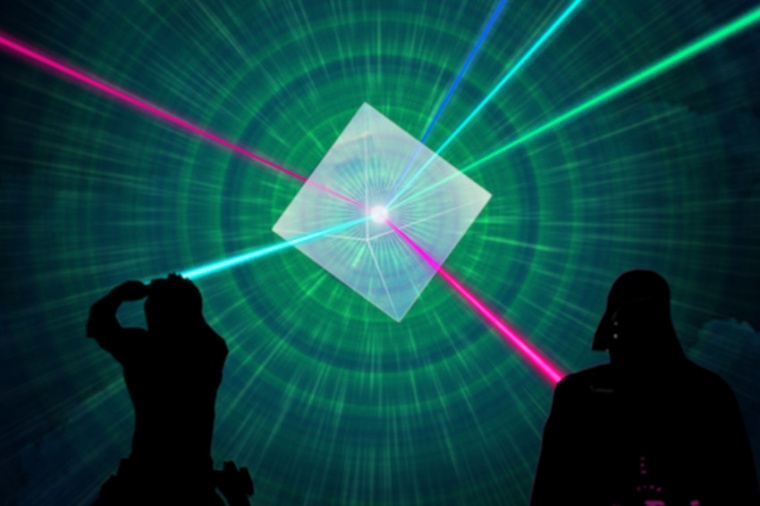 Two light beams from flashlights will not be influenced by each other when they...