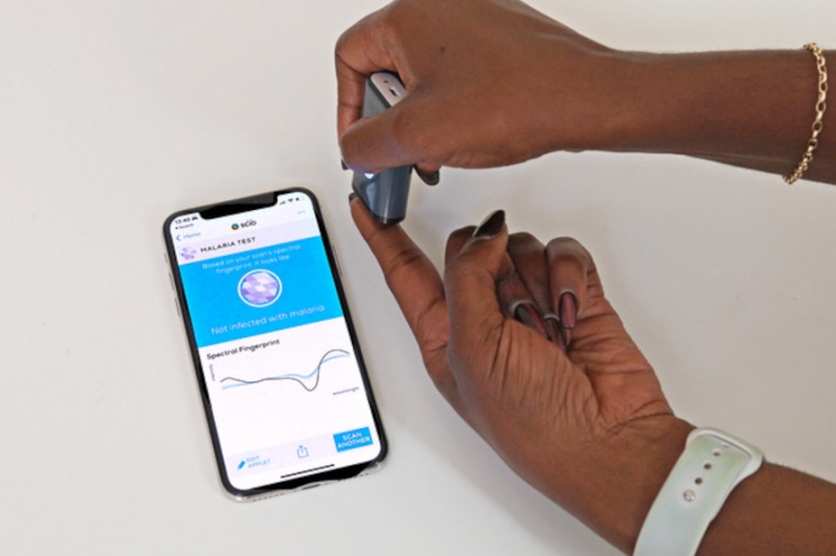 The malaria detection tool collects an infrared signature for a mobile phone to...