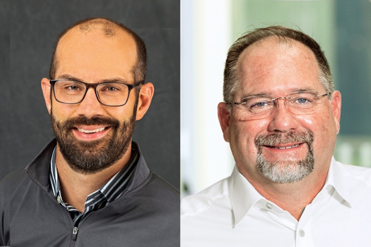 Dan Gray, Founder and President of Gray Optics (left) and Wallace Latimer,...