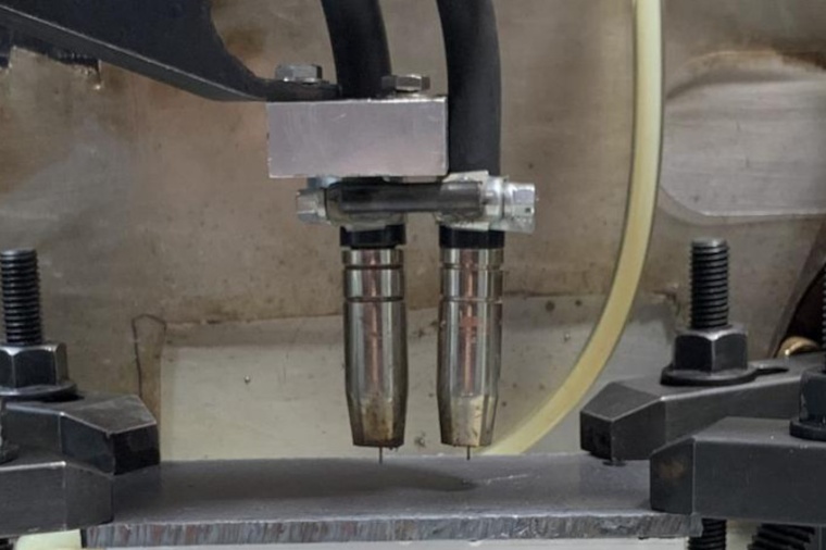 Part of the new hybrid setup that creates parts using precise computer...