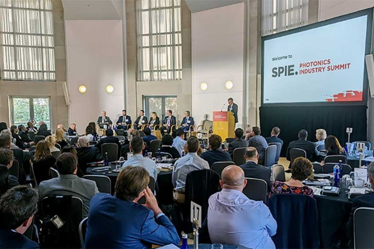 Conference at the SPIE Photonics Industry Summit with speakers and listeners....
