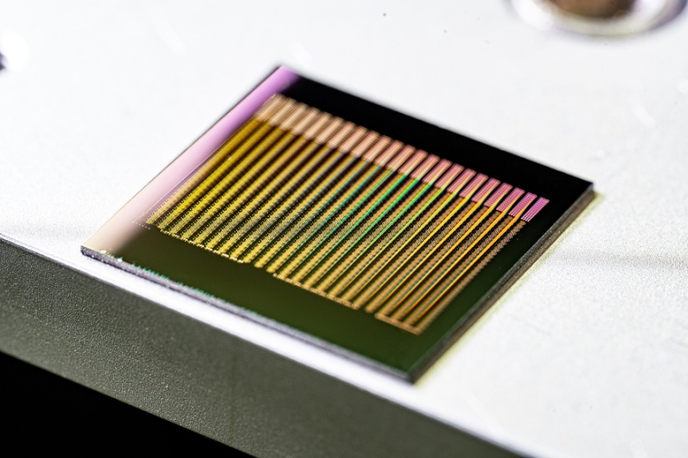 The chip contains almost 8,400 functioning artificial neurons from...