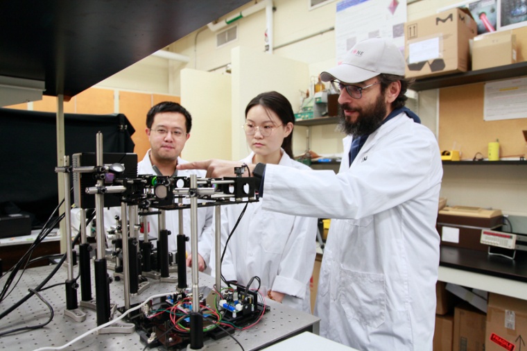 Jinyang Liang, Miao Liu and Fiorenzo Vetrone from INRS in front of the...