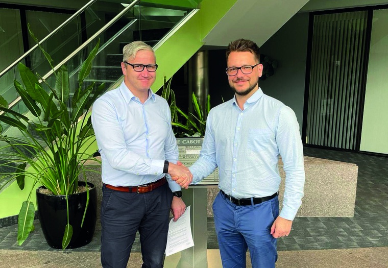 Handshake for a strategic partnership. Managing director Andreas Wegner-Berndt...