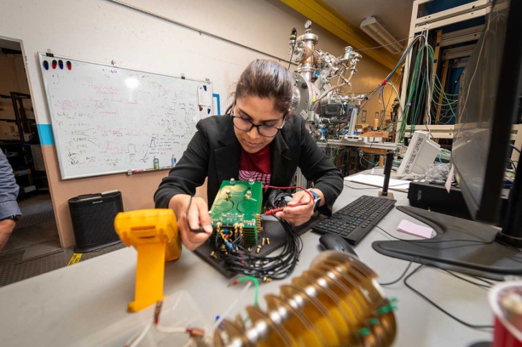 Kaushalya Jhuria in the lab testing the electronics that are part of the...