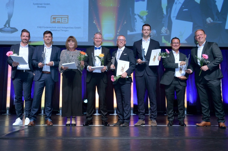 Managing Director Fabian Baur accepts the award at the “Grand Prize for Small...